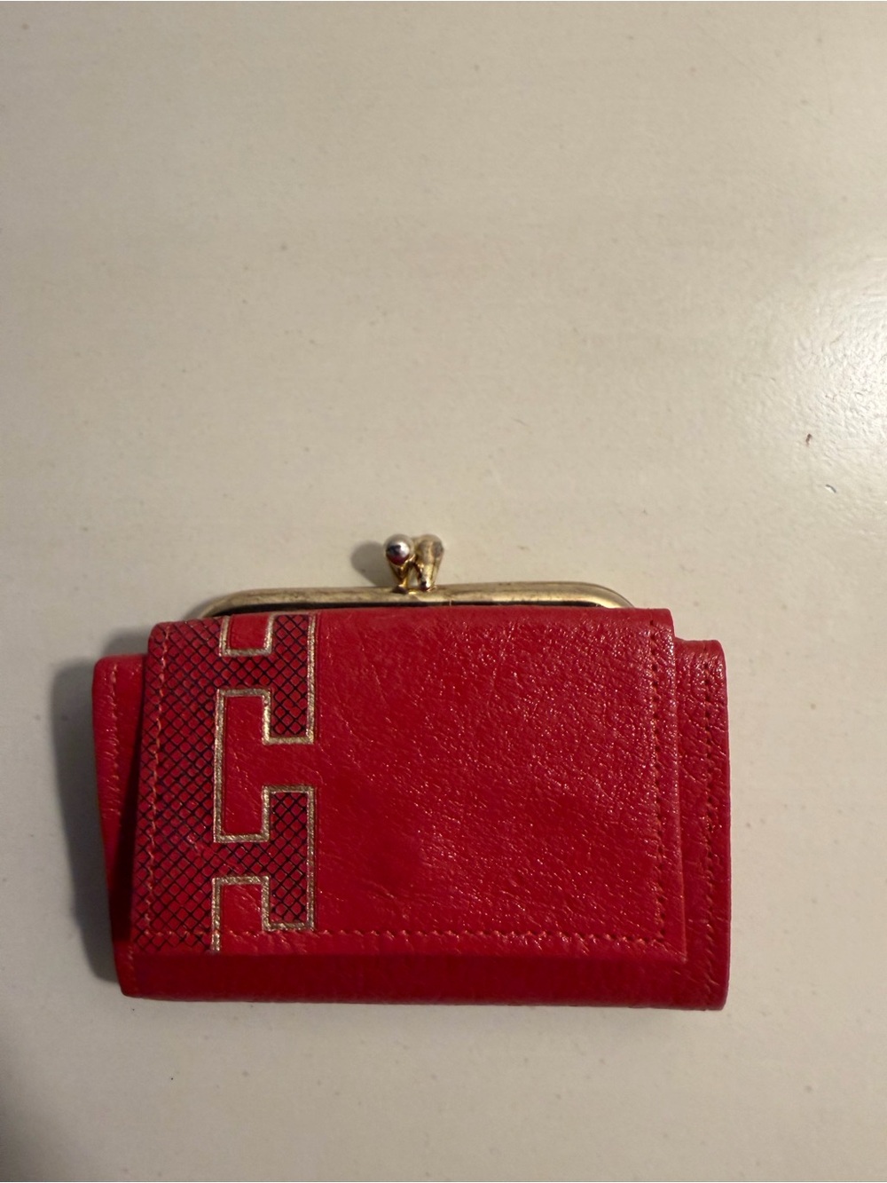 Classic Red Kiss-Lock Leather Wallet with Geometric Trim